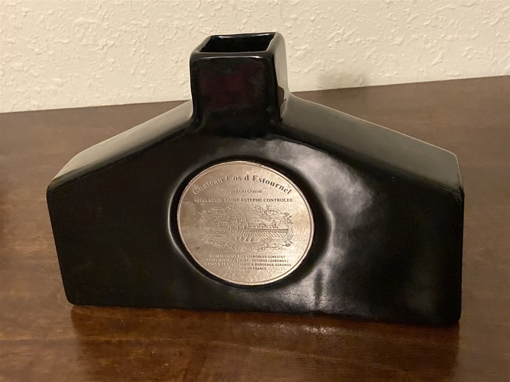 Black pottery vase or decanter/ Chateau Cos d&rsquo;Estournel vineyard