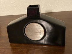 Black pottery vase or decanter/ Chateau Cos d&rsquo;Estournel vineyard