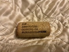 19 Crimes Collectible Wine Cork #13 Assaulting Cutting or Burning Clothes Cork