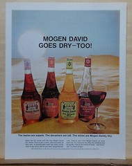1968 magazine ad for Mogen David Wines – Superb taste, tall decanter, dry wines
