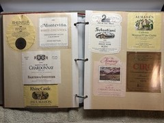 A LOT OF OVER 200 VINTAGE WINE AND LIQUOR BOTTLE LABELS