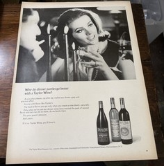 1966 TAYLOR WINE Woman holding a wine glass – Vintage Magazine Ad