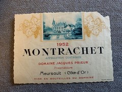 vintage wine labels “Montrachet 1952” “Corton-Charlemagne 1955”