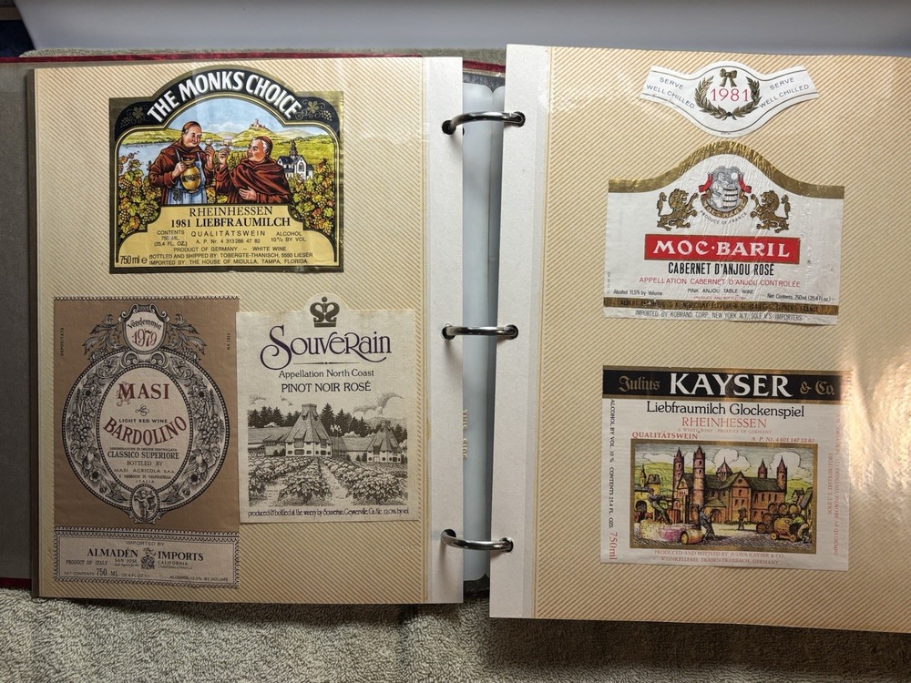 A LOT OF OVER 200 VINTAGE WINE AND LIQUOR BOTTLE LABELS