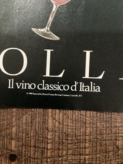 1989 Bolla Wine – Italian Clown Balancing On Glass Holds Bottle – Print Ad Photo