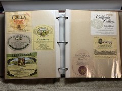 A LOT OF OVER 200 VINTAGE WINE AND LIQUOR BOTTLE LABELS