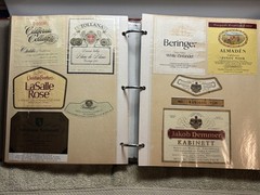 A LOT OF OVER 200 VINTAGE WINE AND LIQUOR BOTTLE LABELS