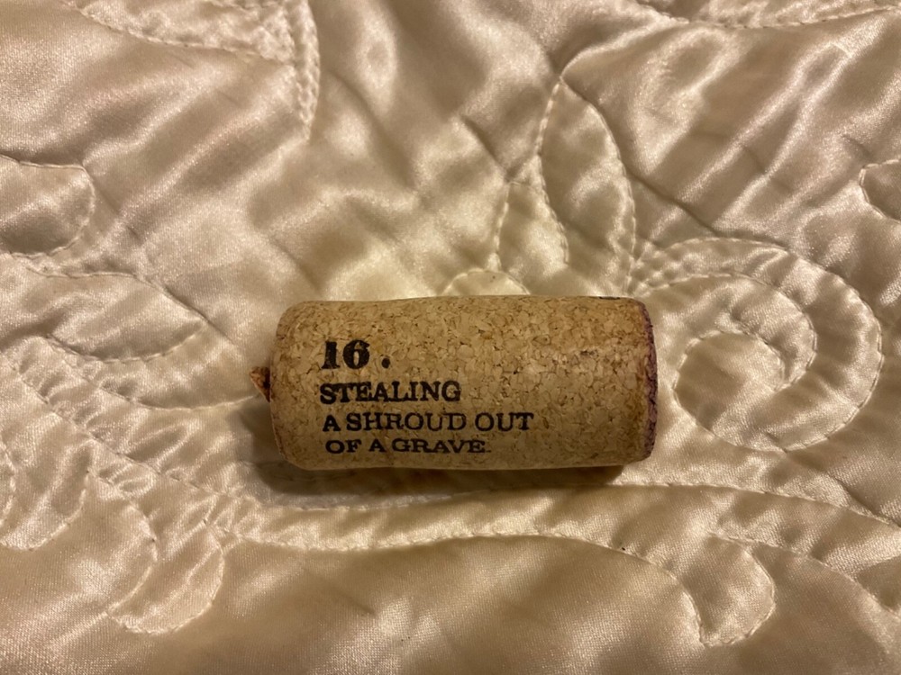 19 Crimes Collectible Wine Cork #16 Stealing A Shroud Out of A Grave Cork 16
